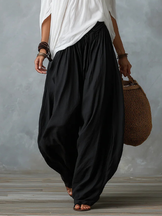 Ensemble top épaules dénudées et pantalon lanterne ample blanc