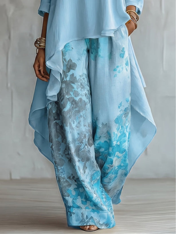 Ensemble haut asymétrique bleu et pantalon large à fleurs