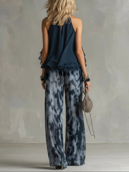 Ensemble en mousseline avec haut licou bleu marine et pantalon palazzo imprimé