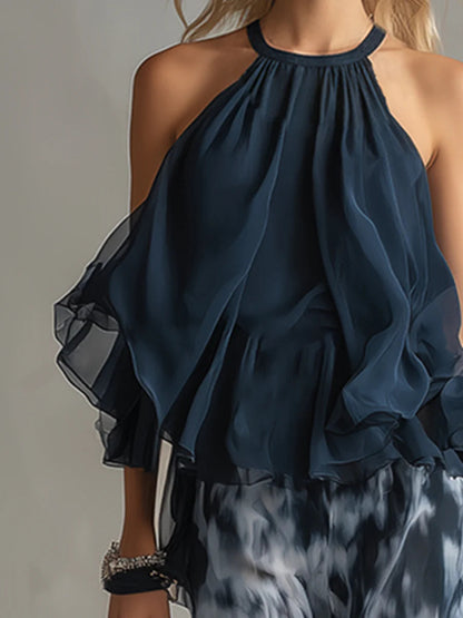 Ensemble en mousseline avec haut licou bleu marine et pantalon palazzo imprimé