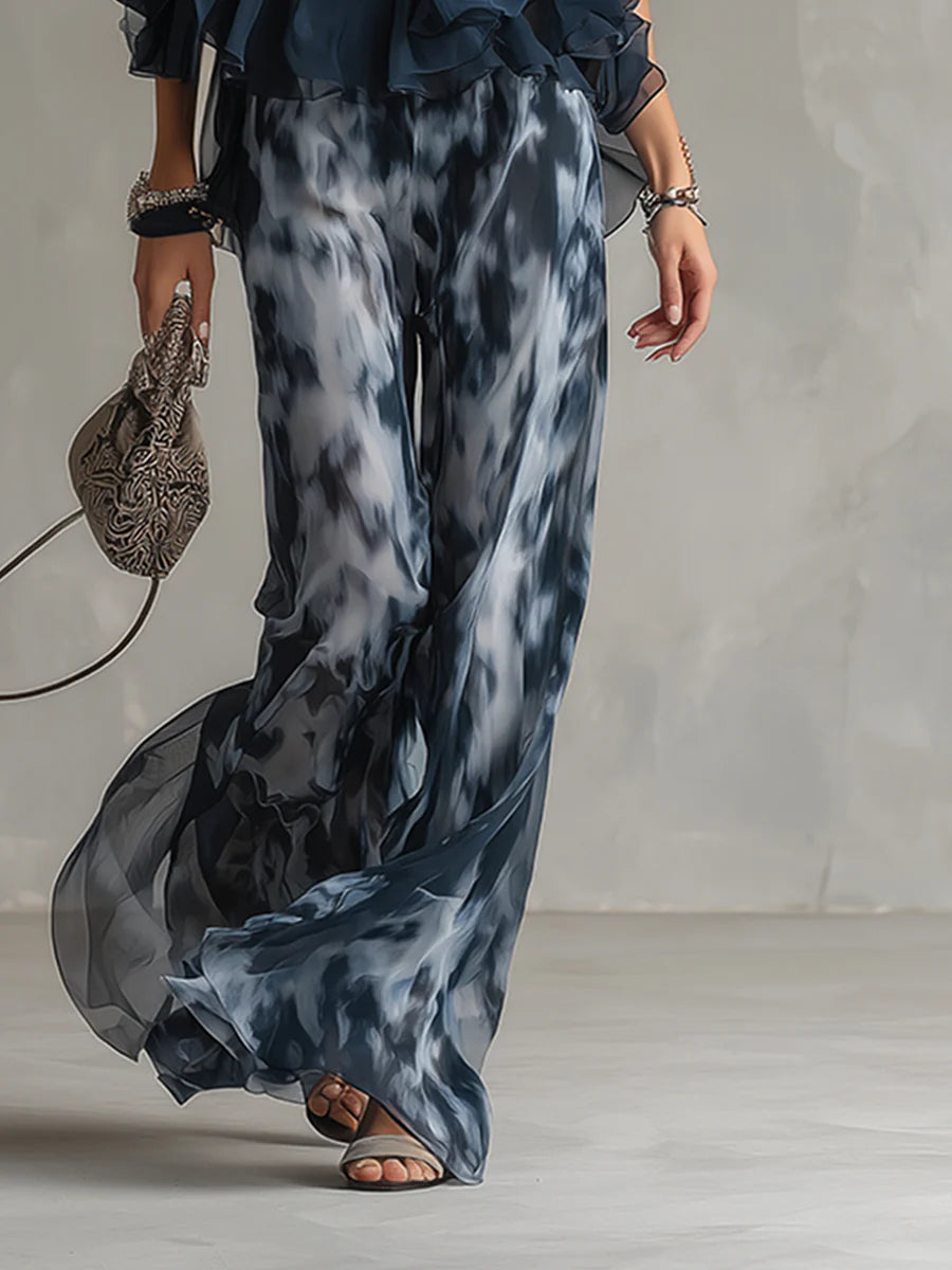 Ensemble en mousseline avec haut licou bleu marine et pantalon palazzo imprimé