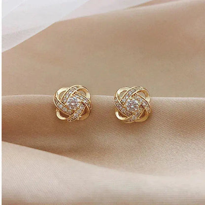 Lourdes - Boucles d'Oreilles Dorées en Spirale avec Cristaux