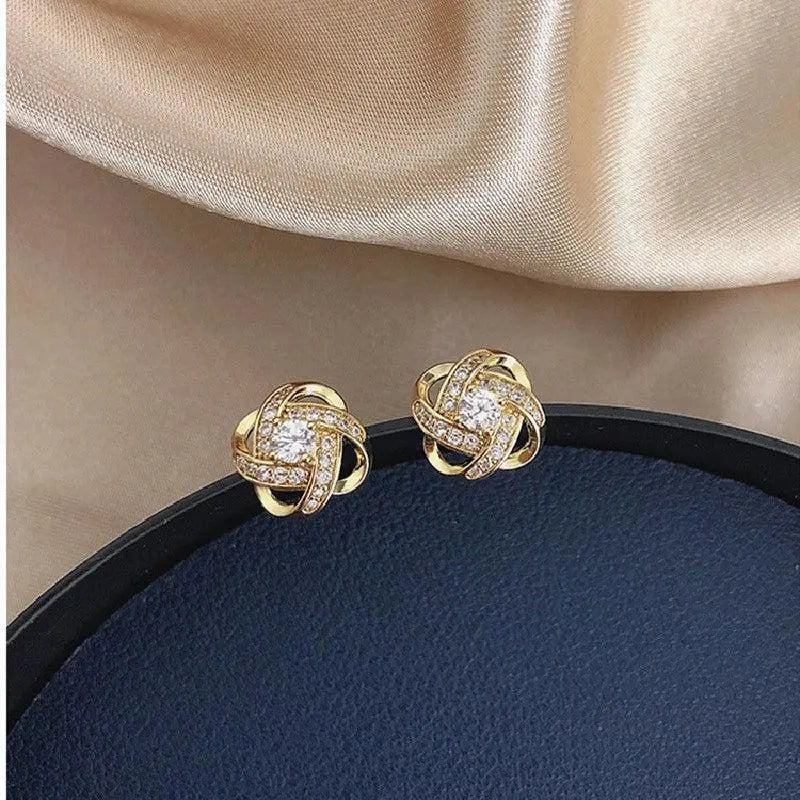 Lourdes - Boucles d'Oreilles Dorées en Spirale avec Cristaux