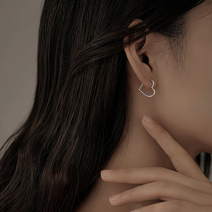 Pilar - Boucles d'Oreilles Dorées en Forme de Cœur en Acier Inoxydable