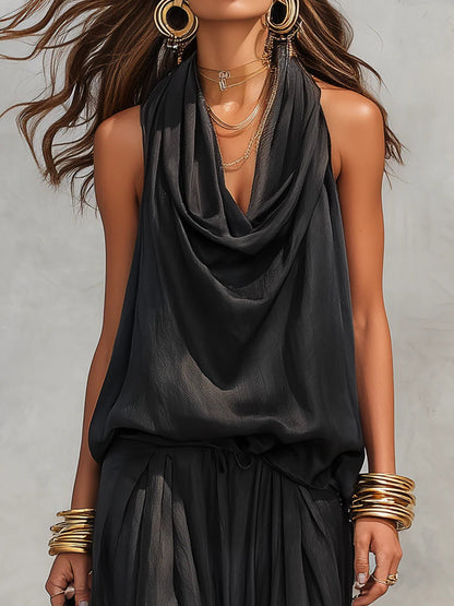 Ensemble top sans manches dos nu noir et pantalon plissé