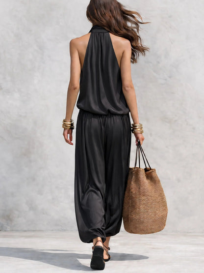 Ensemble top sans manches dos nu noir et pantalon plissé
