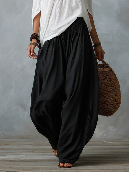 Ensemble top épaules dénudées et pantalon lanterne ample blanc