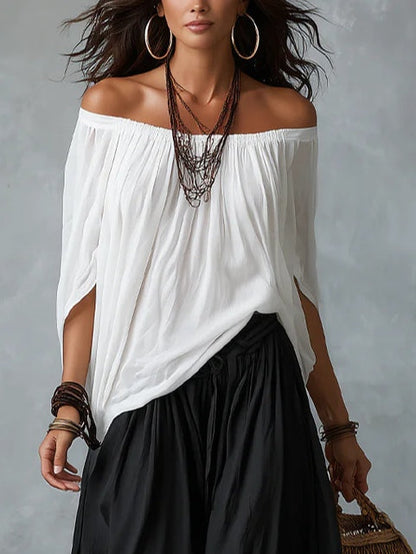 Ensemble top épaules dénudées et pantalon lanterne ample blanc