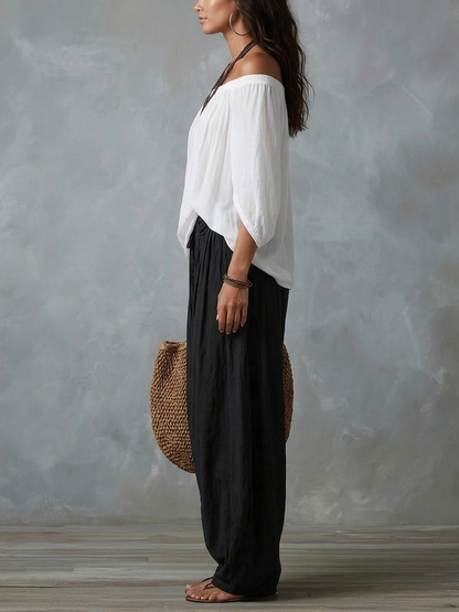 Ensemble top épaules dénudées et pantalon lanterne ample blanc