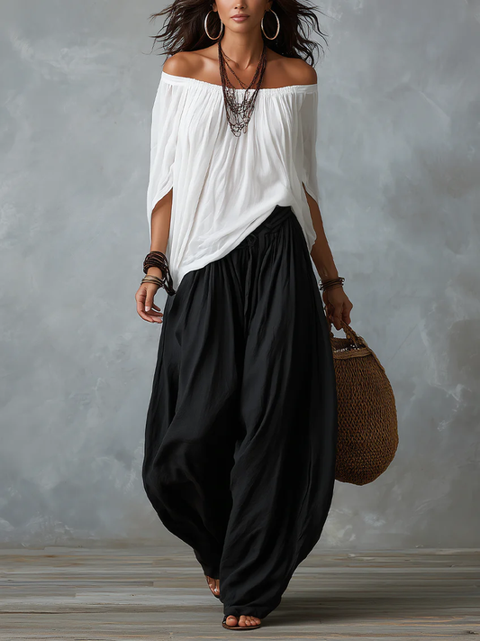 Ensemble top épaules dénudées et pantalon lanterne ample blanc