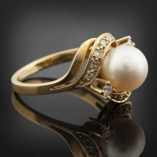 Bague Élégante en Perle et Or Brillant